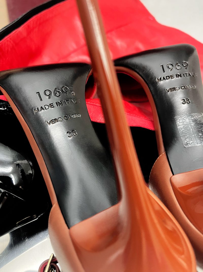 Side profile of brown Nappa leather Pigalle stiletto sandals by 1969 Made in Italy on red leather.