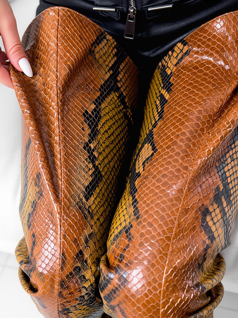 Top down view of Python stamp leather Z25-3 overknee boots on a model, highlighting the exotic scale texture.