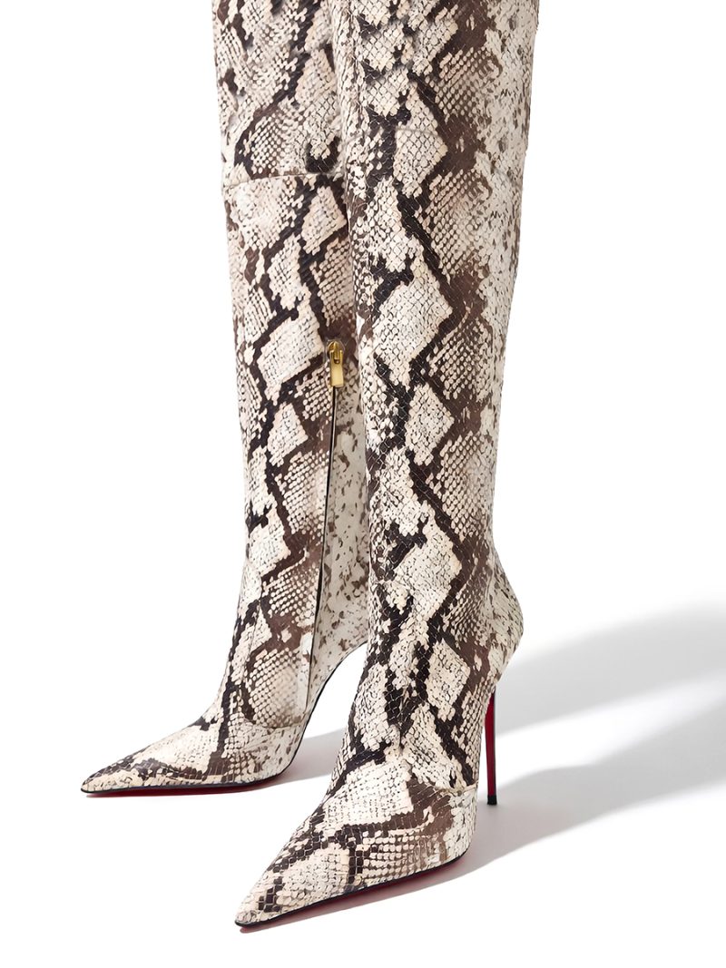 Front view of 1969 Made in Italy ART LX 01 python stamped boots highlighting inner zipper and pointed toe.